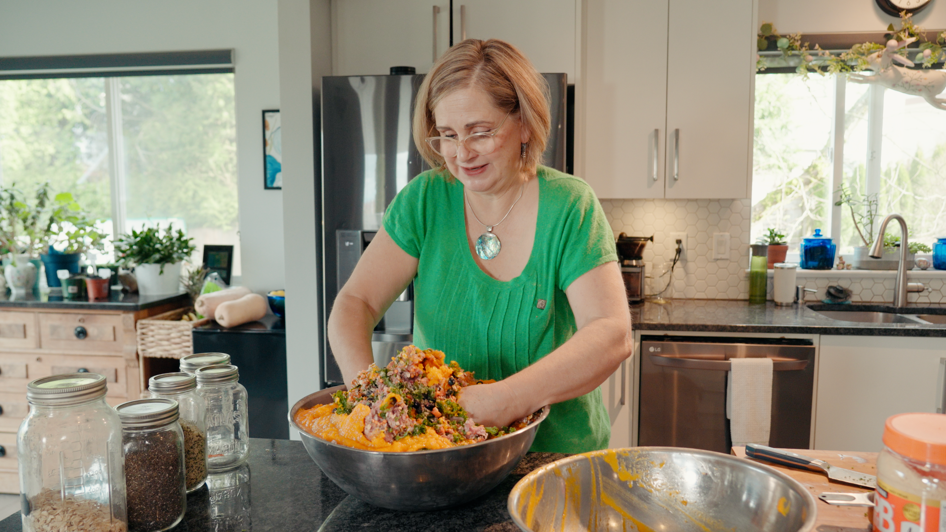 Woman mixing ingredients in a large bowl